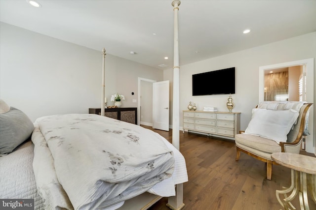 bedroom featuring wood finished floors and recessed lighting