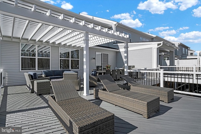 deck with outdoor lounge area and a pergola