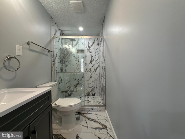 bathroom featuring marble finish floor, a marble finish shower, visible vents, and a textured ceiling