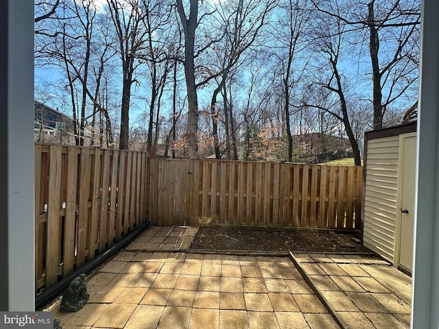 view of patio with a fenced backyard