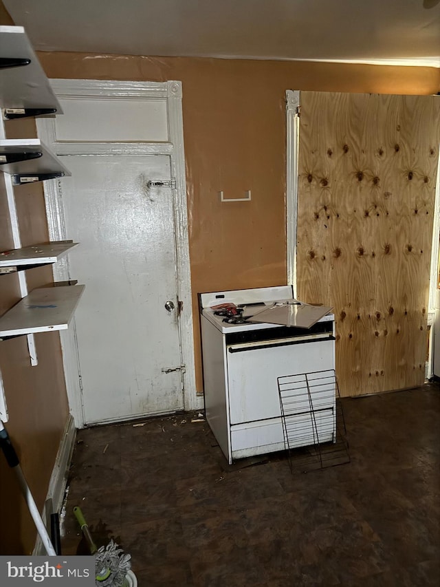 kitchen with white gas range