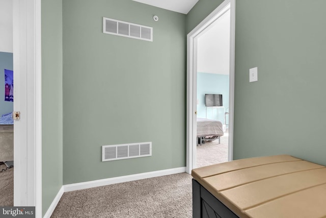 bedroom with baseboards, visible vents, and carpet flooring