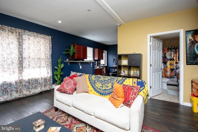 living room with hardwood / wood-style flooring and recessed lighting