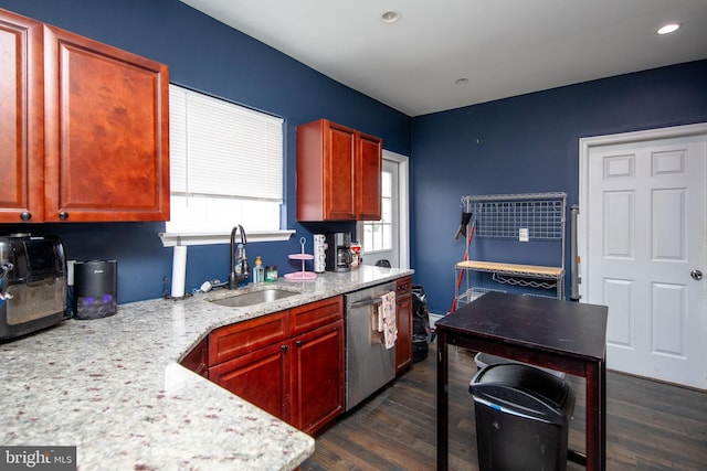 kitchen with recessed lighting, dark wood-style flooring, a sink, light stone countertops, and dishwasher