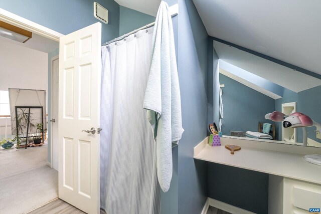 full bath featuring a shower with shower curtain