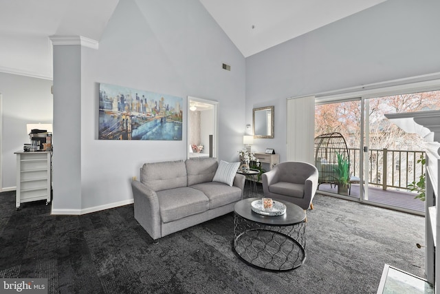 carpeted living room with high vaulted ceiling, visible vents, and baseboards