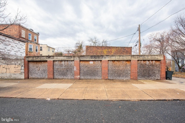 exterior space featuring community garages