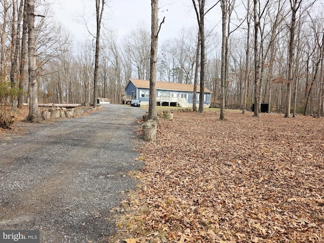 view of front of house with aphalt driveway