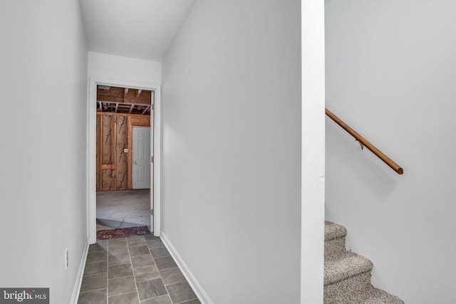 stairway with baseboards