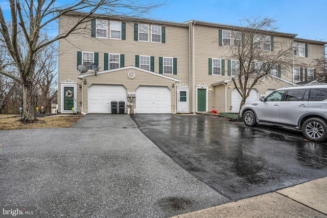 view of property featuring driveway