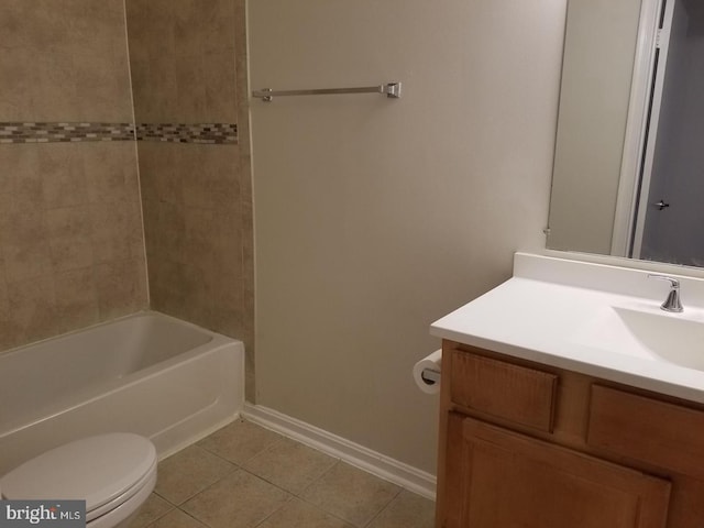 full bath featuring toilet, vanity, baseboards, and tile patterned floors