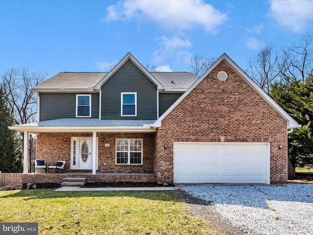 traditional-style home featuring a front lawn, driveway, covered porch, a garage, and brick siding