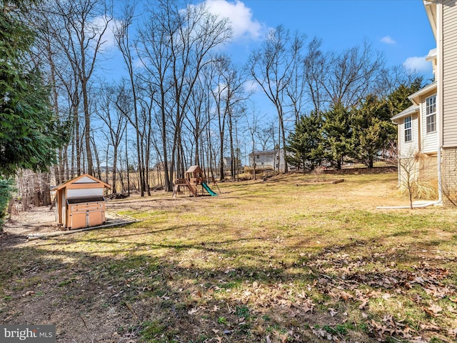 view of yard with a playground