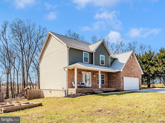 traditional-style house with fence, a shingled roof, a front lawn, a garage, and brick siding