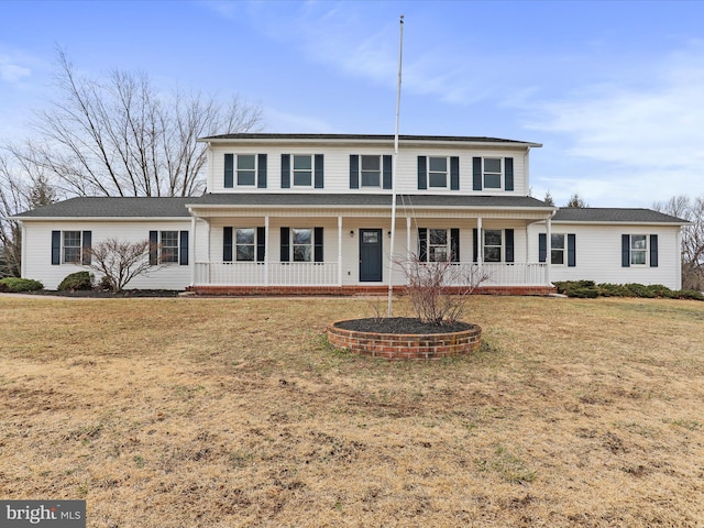 view of front of house featuring a porch and a front yard