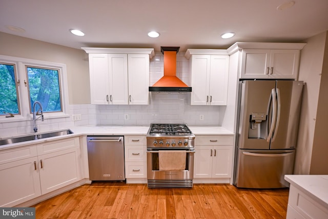 622 Hastings Rd, Baltimore, MD 21286 - kitchen featuring stainless steel appliances, premium range hood, white cabinets, backsplash, and recessed lighting