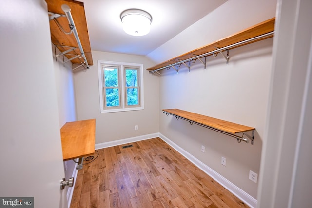 622 Hastings Rd, Baltimore, MD 21286 - walk in closet with wood finished floors and vaulted ceiling