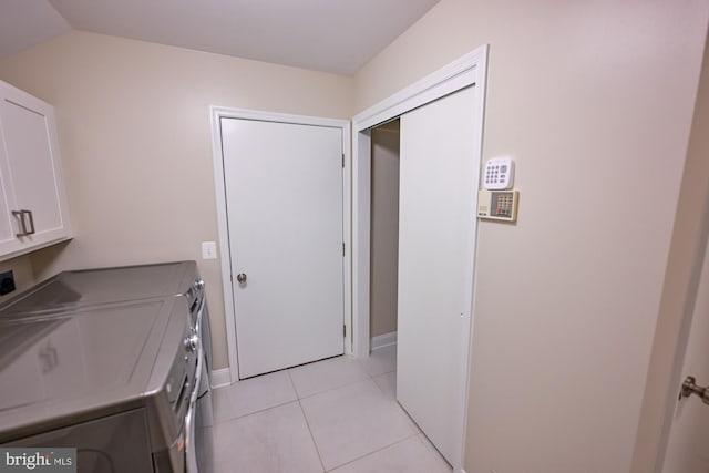 622 Hastings Rd, Baltimore, MD 21286 - laundry room featuring cabinet space, independent washer and dryer, and light tile patterned floors