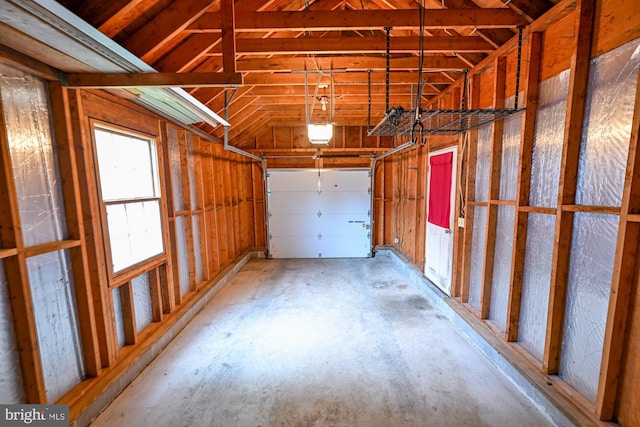 622 Hastings Rd, Baltimore, MD 21286 - garage featuring a garage door opener