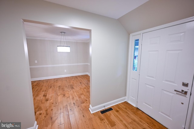 622 Hastings Rd, Baltimore, MD 21286 - entryway featuring light wood-style flooring and vaulted ceiling