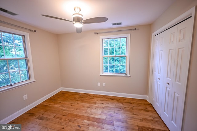 622 Hastings Rd, Baltimore, MD 21286 - unfurnished bedroom with light wood-style flooring, a closet, and ceiling fan