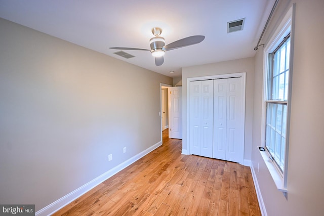 622 Hastings Rd, Baltimore, MD 21286 - unfurnished bedroom with light wood finished floors, a closet, and ceiling fan