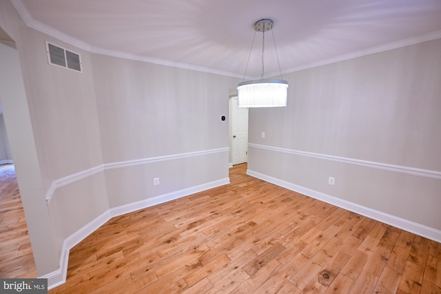 622 Hastings Rd, Baltimore, MD 21286 - spare room featuring wood finished floors and crown molding