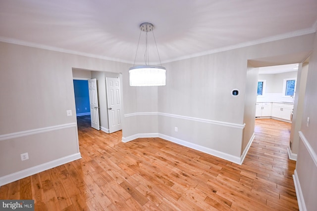 622 Hastings Rd, Baltimore, MD 21286 - unfurnished room with light wood-style flooring and ornamental molding