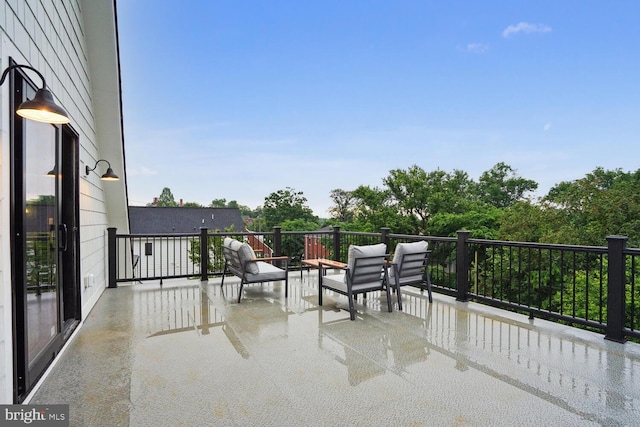 view of patio / terrace with a balcony