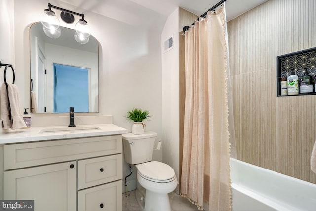 full bath with toilet, shower / bath combo with shower curtain, vanity, and visible vents