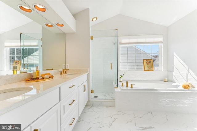 bathroom featuring a shower stall, a healthy amount of sunlight, marble finish floor, and vaulted ceiling