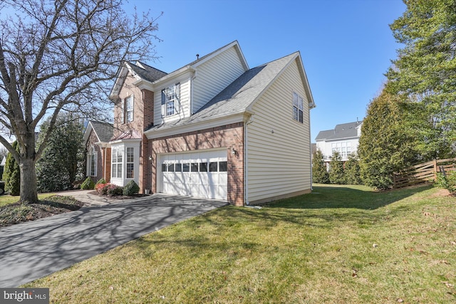 view of property exterior with driveway, fence, a yard, a garage, and brick siding