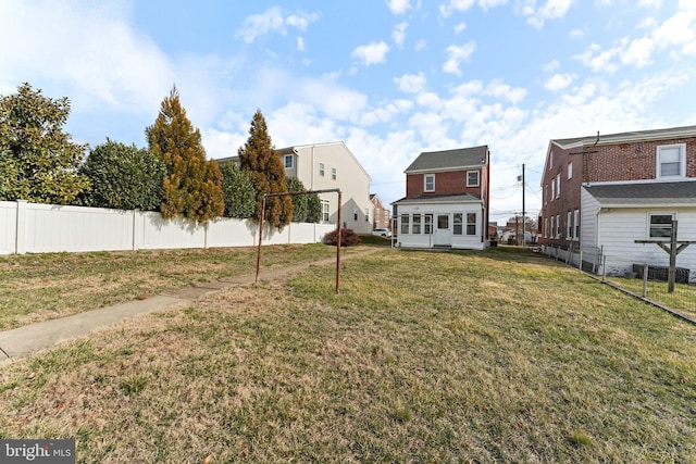 view of yard with fence