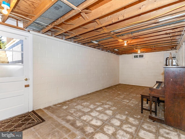 basement featuring tile patterned floors