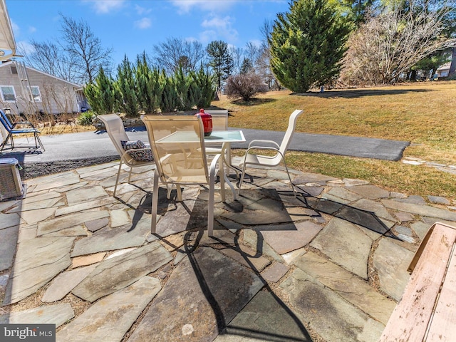 view of patio with outdoor dining area