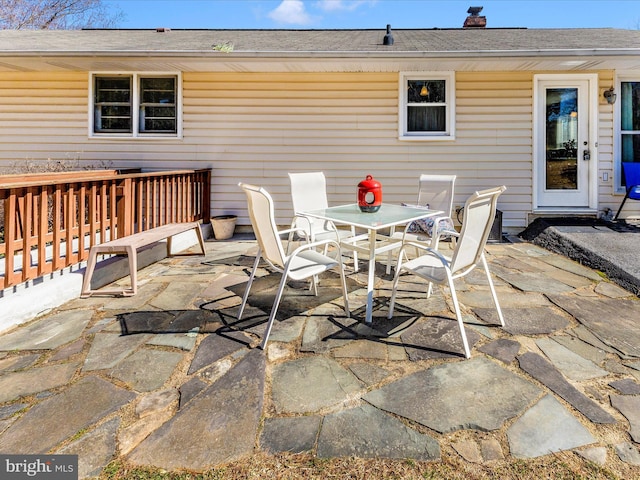 view of patio with outdoor dining area