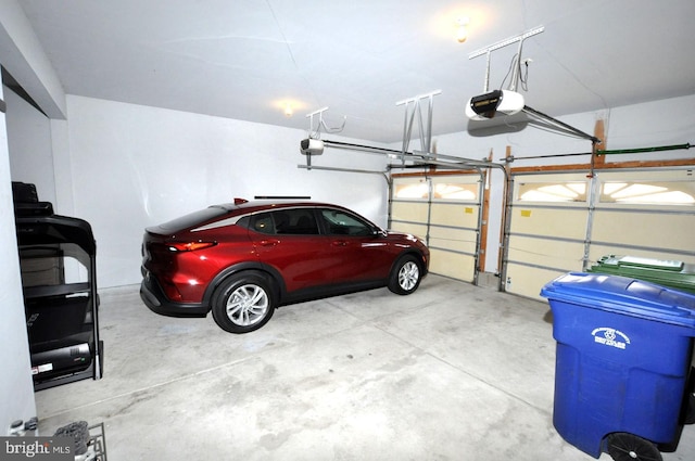 garage featuring a garage door opener