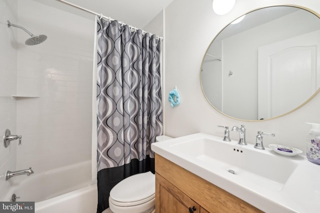 full bath with shower / bath combination with curtain, vanity, and toilet