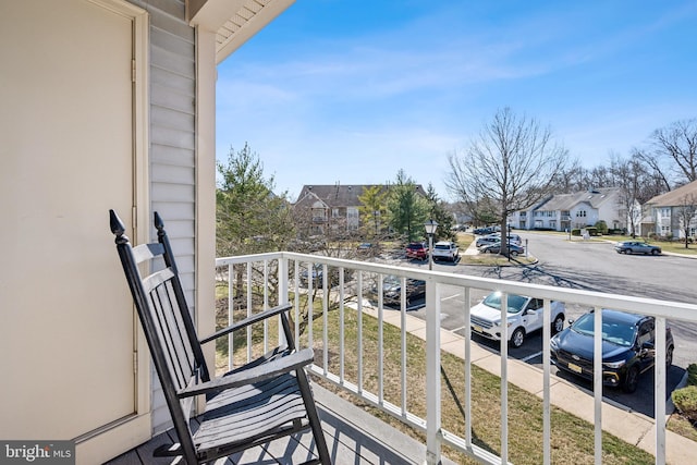 balcony featuring a residential view