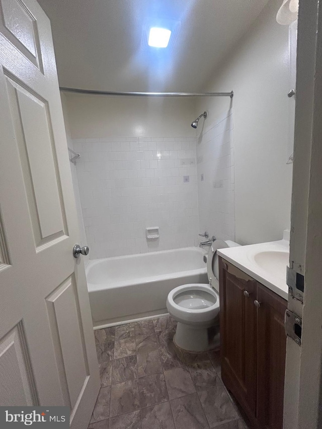 bathroom featuring vanity, toilet, and shower / bath combination
