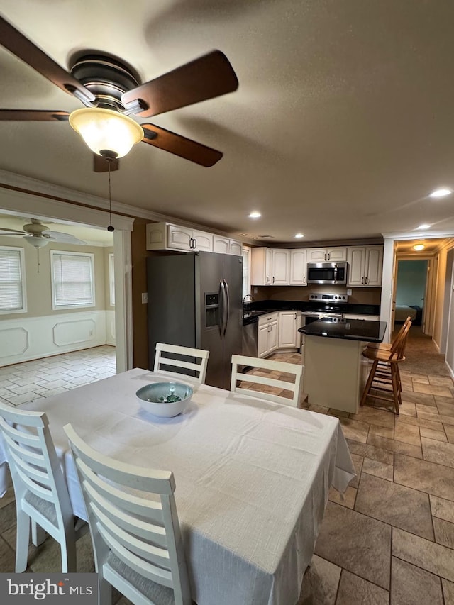 22 Alden Ct, Berlin, MD 21811 - dining space featuring stone tile floors, a ceiling fan, and recessed lighting