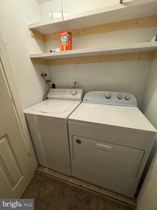 22 Alden Ct, Berlin, MD 21811 - laundry room featuring separate washer and dryer and light tile patterned floors