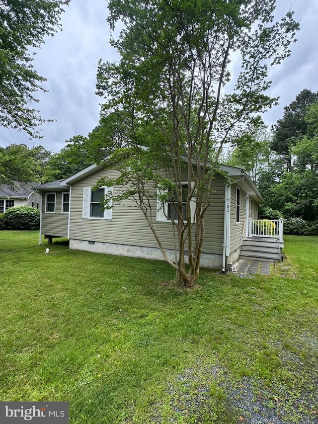 22 Alden Ct, Berlin, MD 21811 - view of home's exterior featuring a yard and crawl space