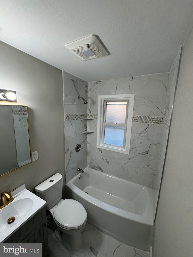 bathroom featuring vanity, visible vents, bathing tub / shower combination, toilet, and marble finish floor