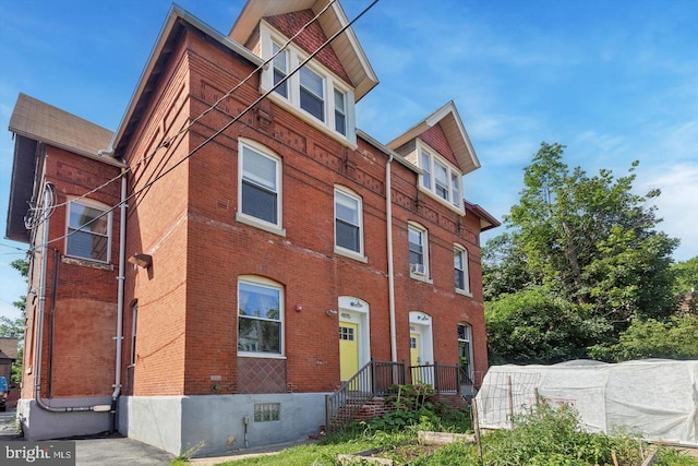 view of front of home with brick siding