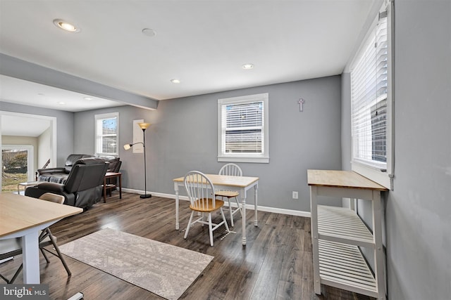 dining area featuring recessed lighting, baseboards, and wood finished floors