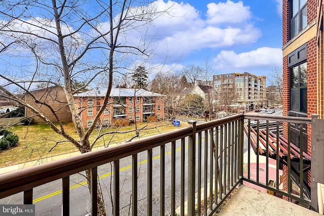 balcony featuring a residential view