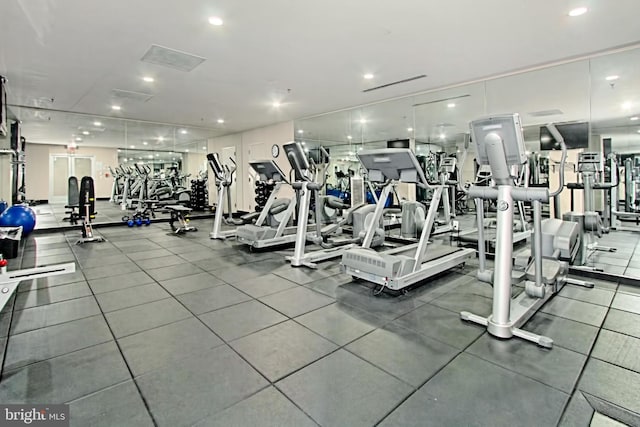 workout area featuring recessed lighting