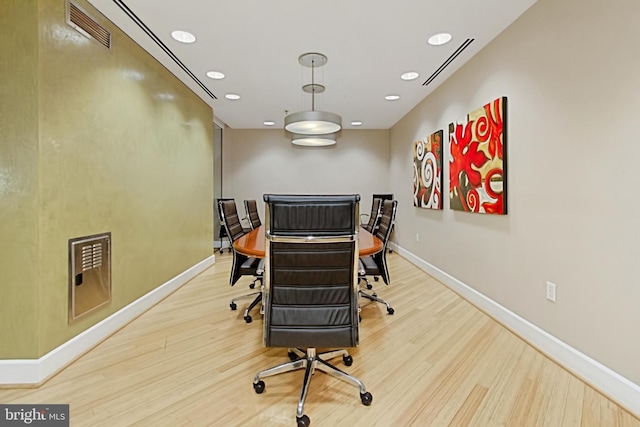 office area with recessed lighting, visible vents, baseboards, and wood finished floors