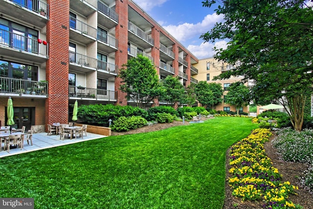 view of community with a lawn